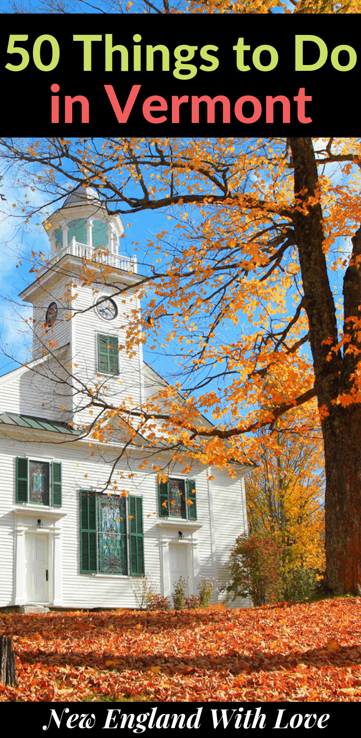 White church with a fall tree in front of it