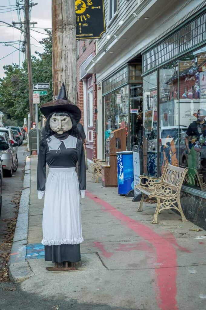 Life sized mannequin of a witch standing outside of a store in Salem