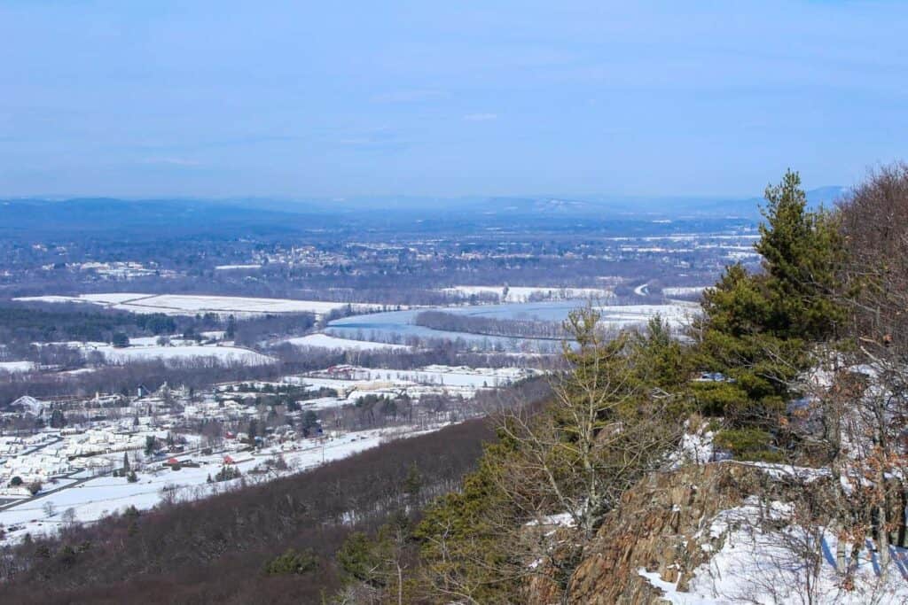 A view of a snow covered town in the distance