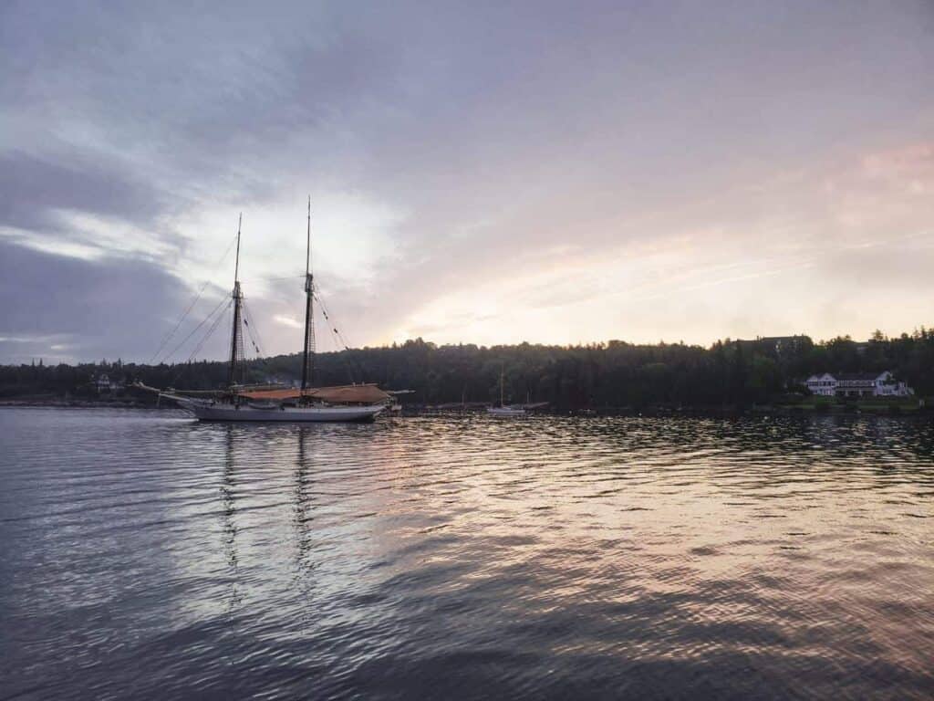 Sailboat on the water at dusk