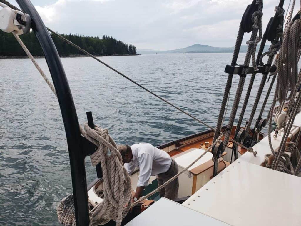 A person in a boat on a body of water.