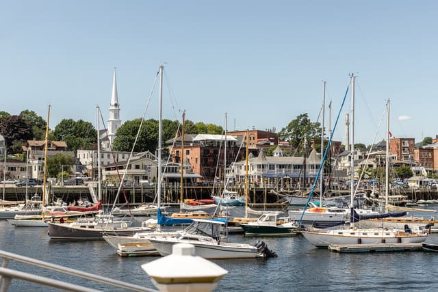 Many boats docked on a waterfront