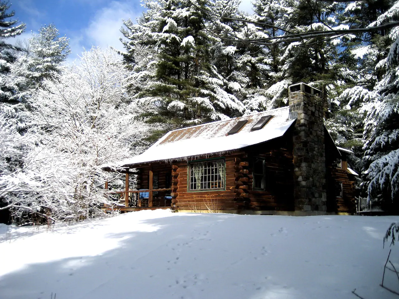 Cottage in the woods in the snow
