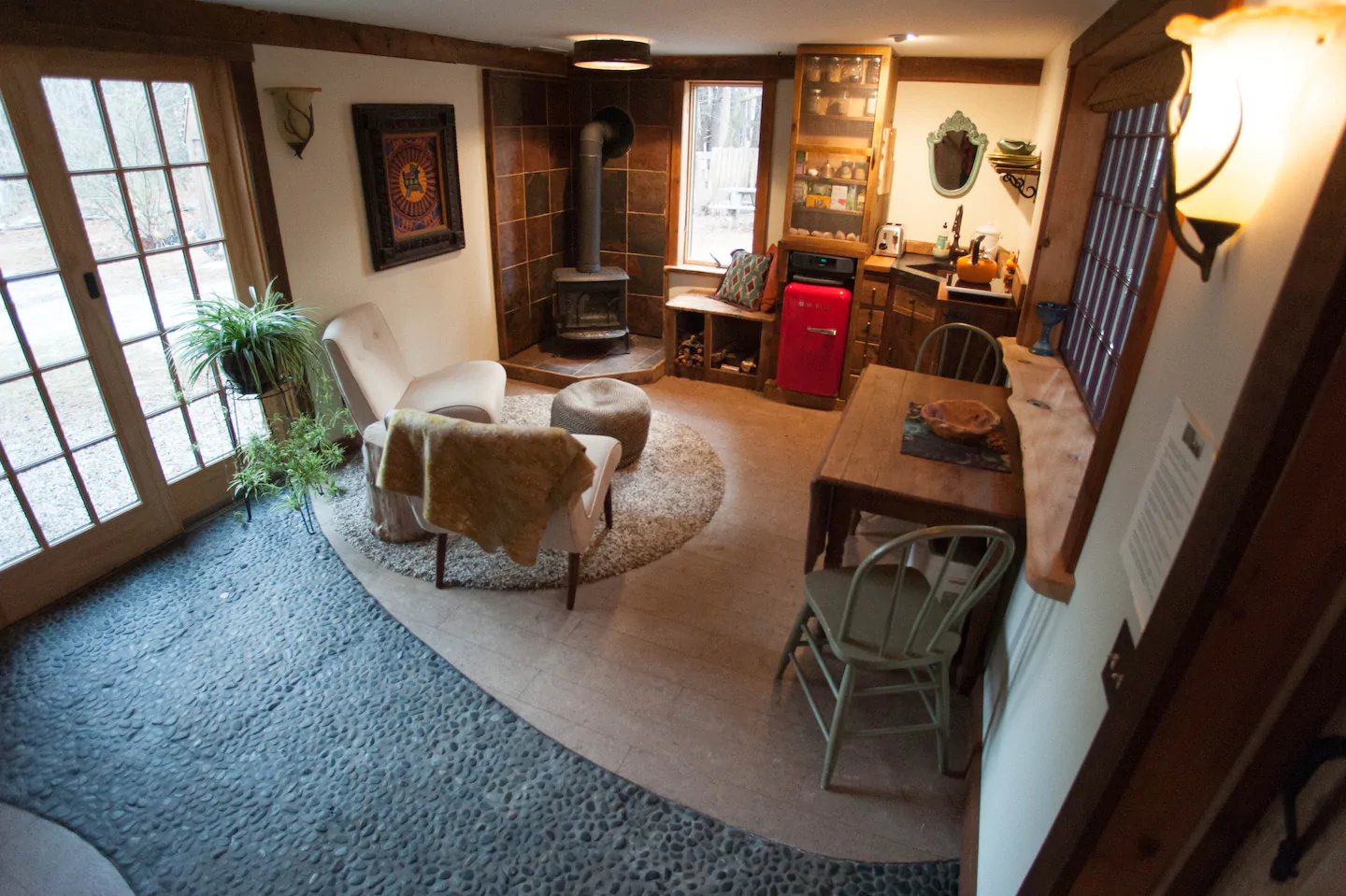 A living room filled with furniture and a fire place