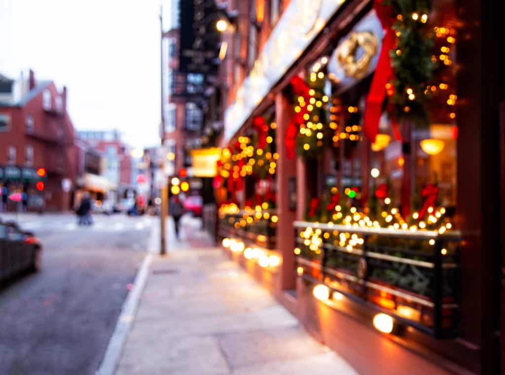 Blurred out view of a storefront with lights in Massachusetts.