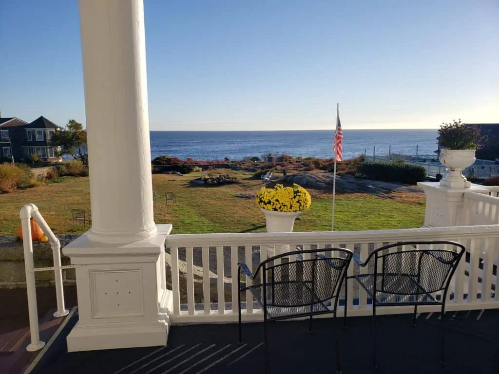 Water front view from a porch at one of the top inns in Rockport, Massachusetts on a sunny day