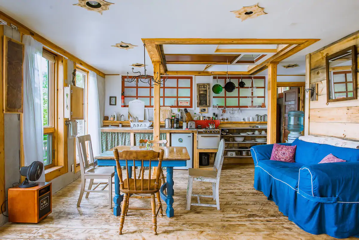 Lovely great room with sofa and dining table