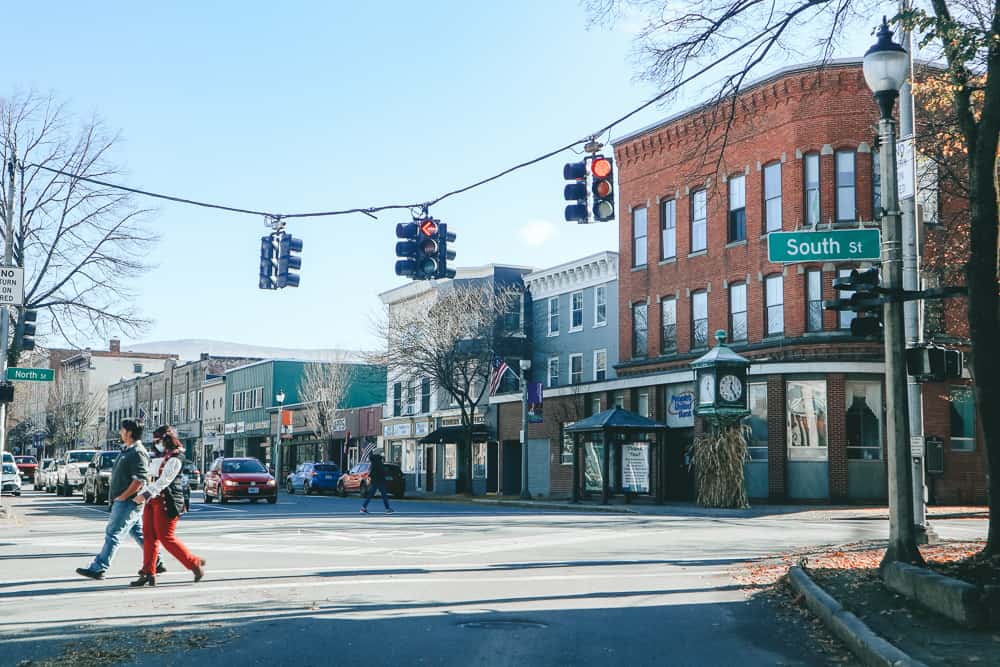 Scene of downtown Bennington Vermont with street lights strung across the street