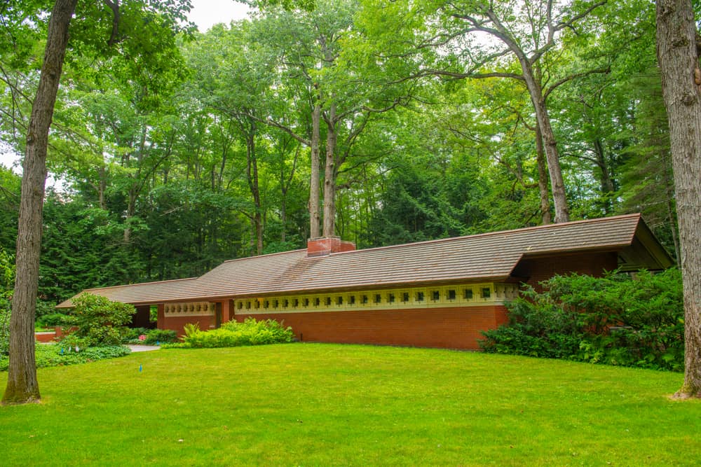 A building in front of a green lawn