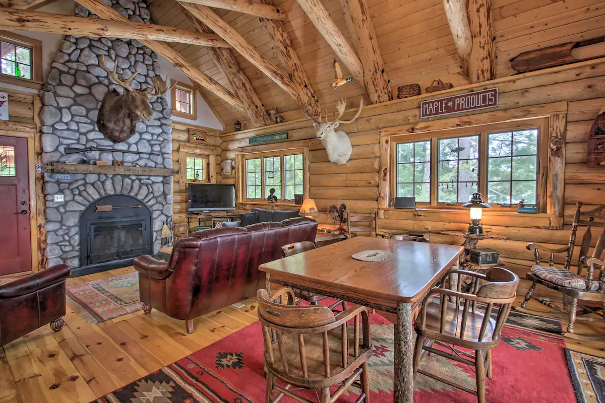Interior of a mountain chalet with a stone fireplace