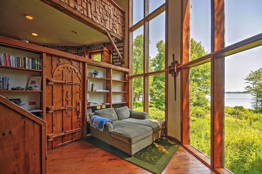 Interior chalet with circular room of windows at a gorgeous New England VRBO