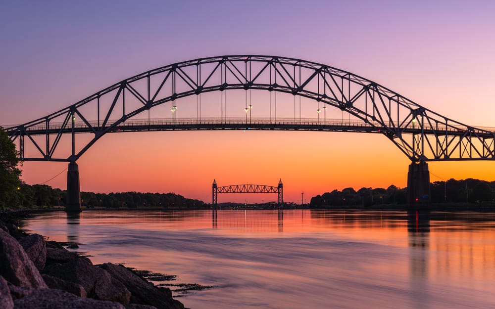 A bridge over the river at sunset