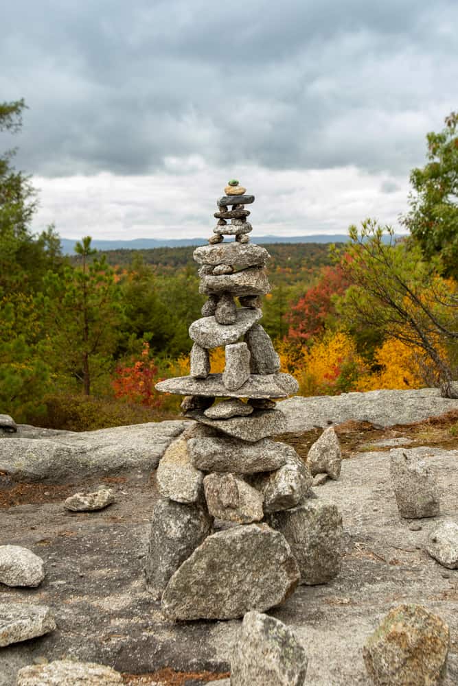 A rock formation in the mountains in the fall