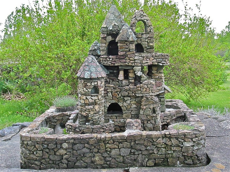 Statue of a stone castle on a pedestal