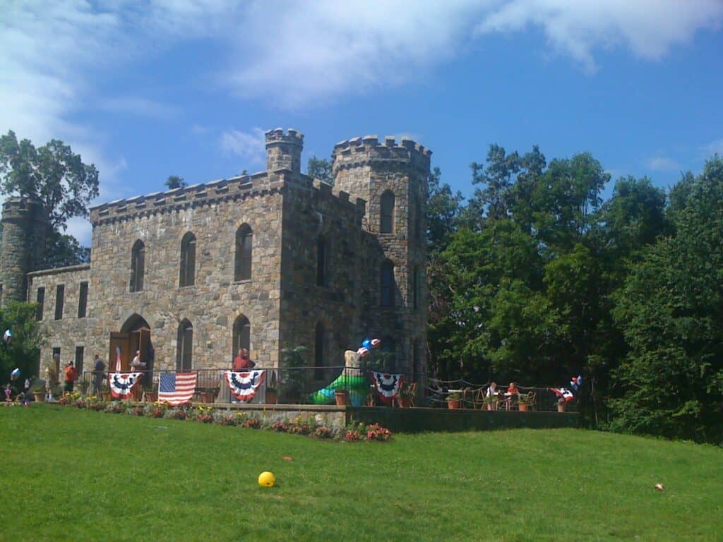 A castle surrounded by flags of various nations