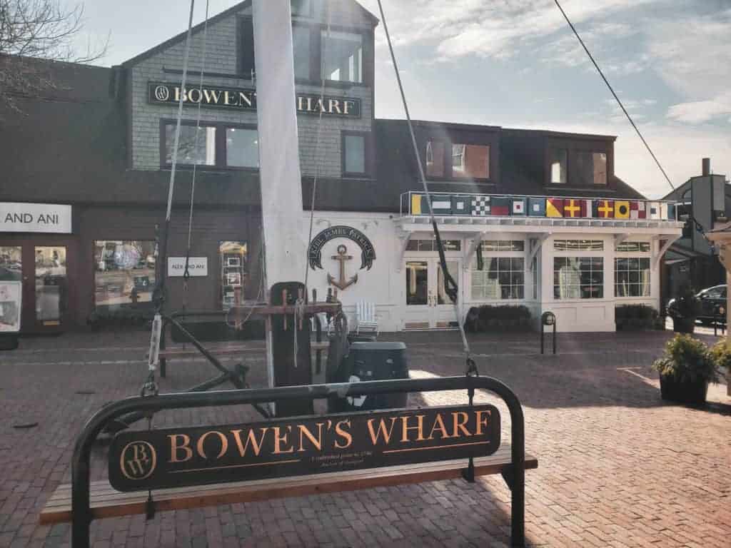 Bowen's Wharf sign on a cobblestone street in Newport, Rhode Island