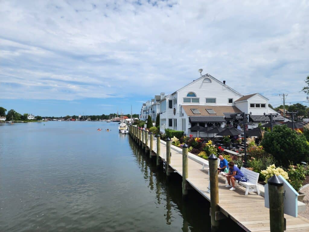 A long walking pier beside the Mystic River in Mystic Connecticut