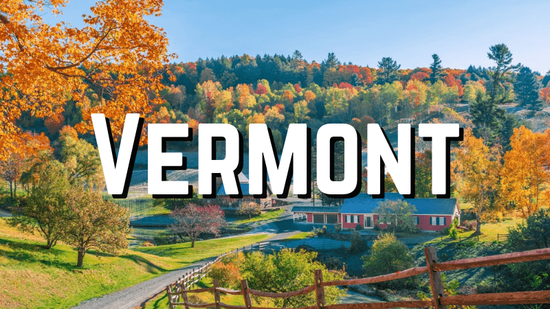 header image for vermont vacations guide - photo of an autumnal farm scene at sunset with a long driveway leading up from a barn