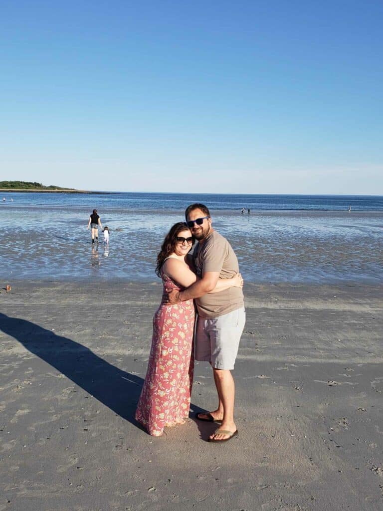 A couple hug on one of the beaches in Kennebunkport, Maine