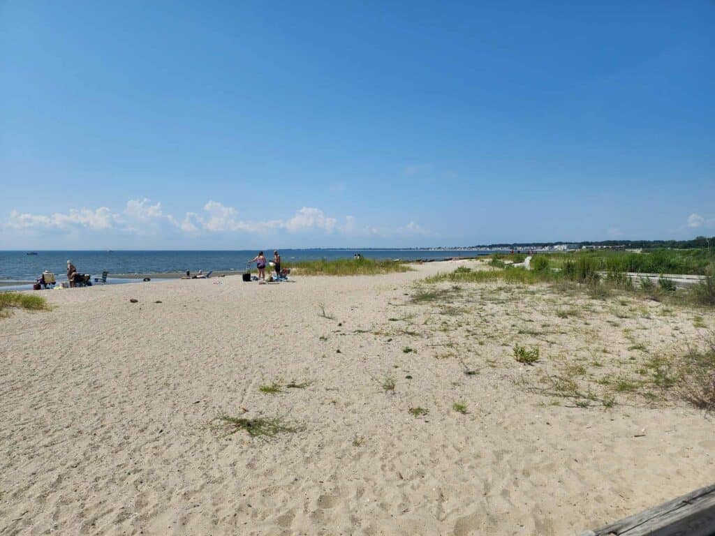A wide sandy expanse of beach in Milford, Connecticut
