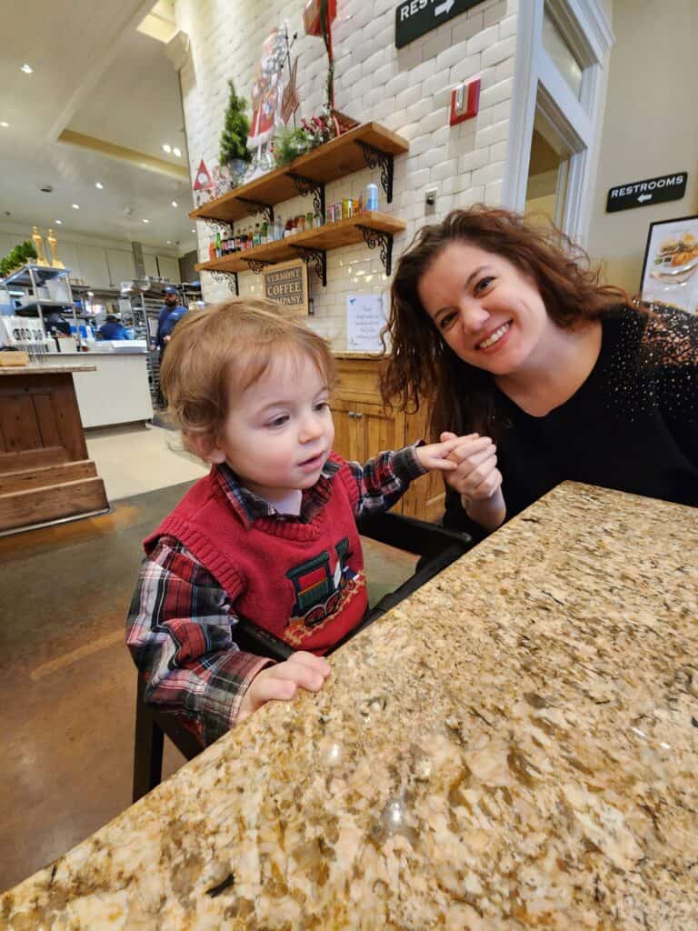 A woman and toddler sit at the Stonewall Kitchen Cafe in York, Maine