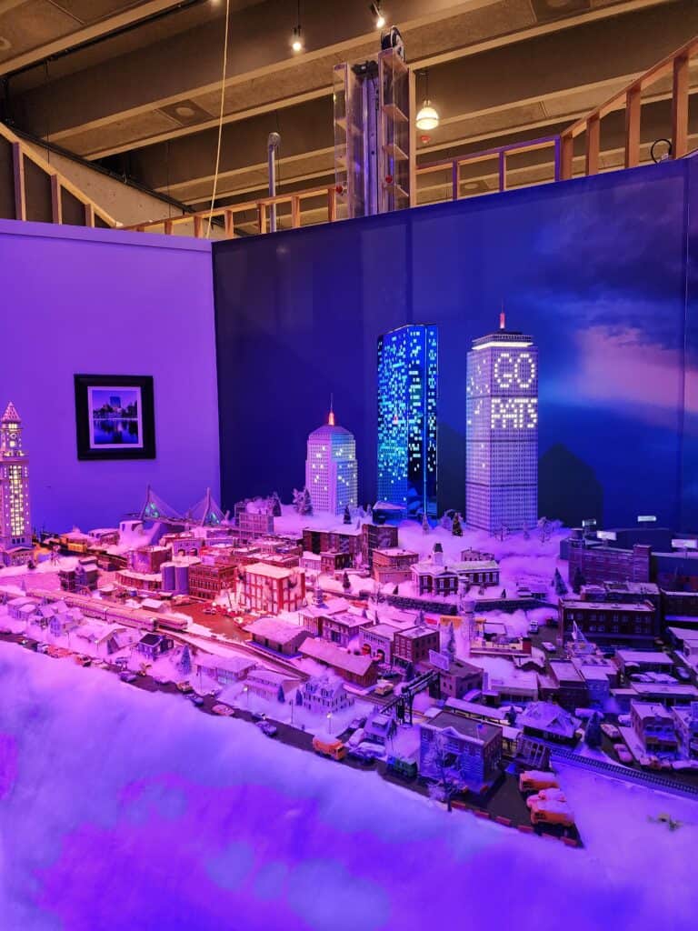 The city of Boston in miniature set up as the scene for a model train track